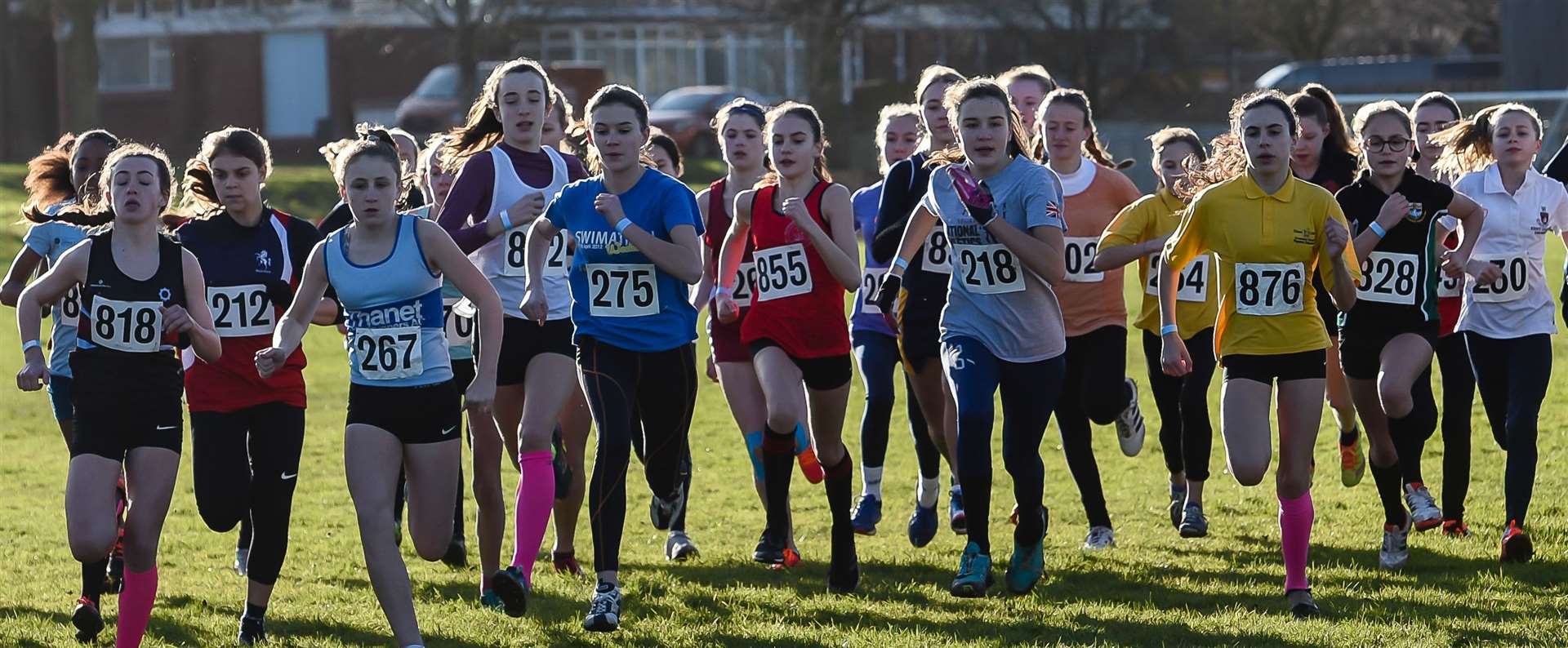 Runners jostle for position as the junior girls' race gets under way at the Kent Schools Cross-Country Championships Picture: Alan Langley FM27057278