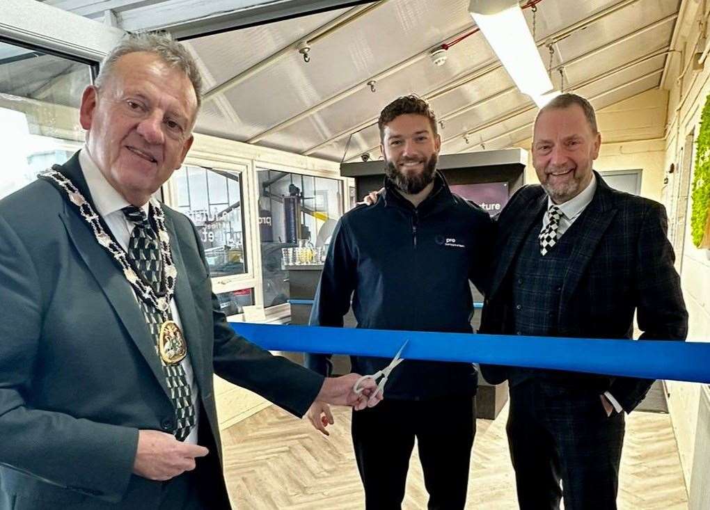 The Mayor of Tunbridge Wells, Cllr Hugh Patterson, cuts the ribbon to open Prohire's new workshop, with Ashley Bourne, depot operations manager, and company CEO Pat Skelly