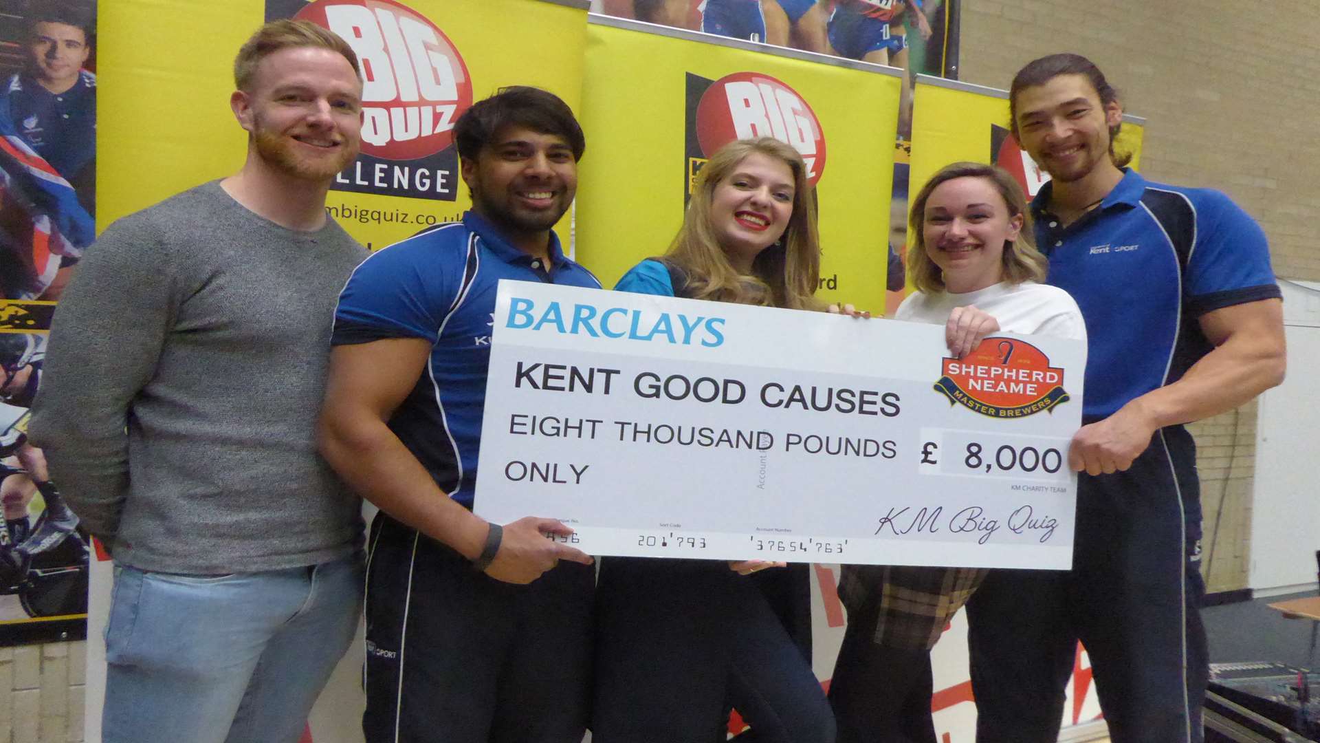 Joe Walker of the Kentish Gazette, Arik Vadevalloo of Kent Sport, Rebecca Hadley and Zoe Berry of Barclays joined Alex Atkins of Kent Sport to announce the amount raised for charity at last year's Canterbury KM Big Quiz event.