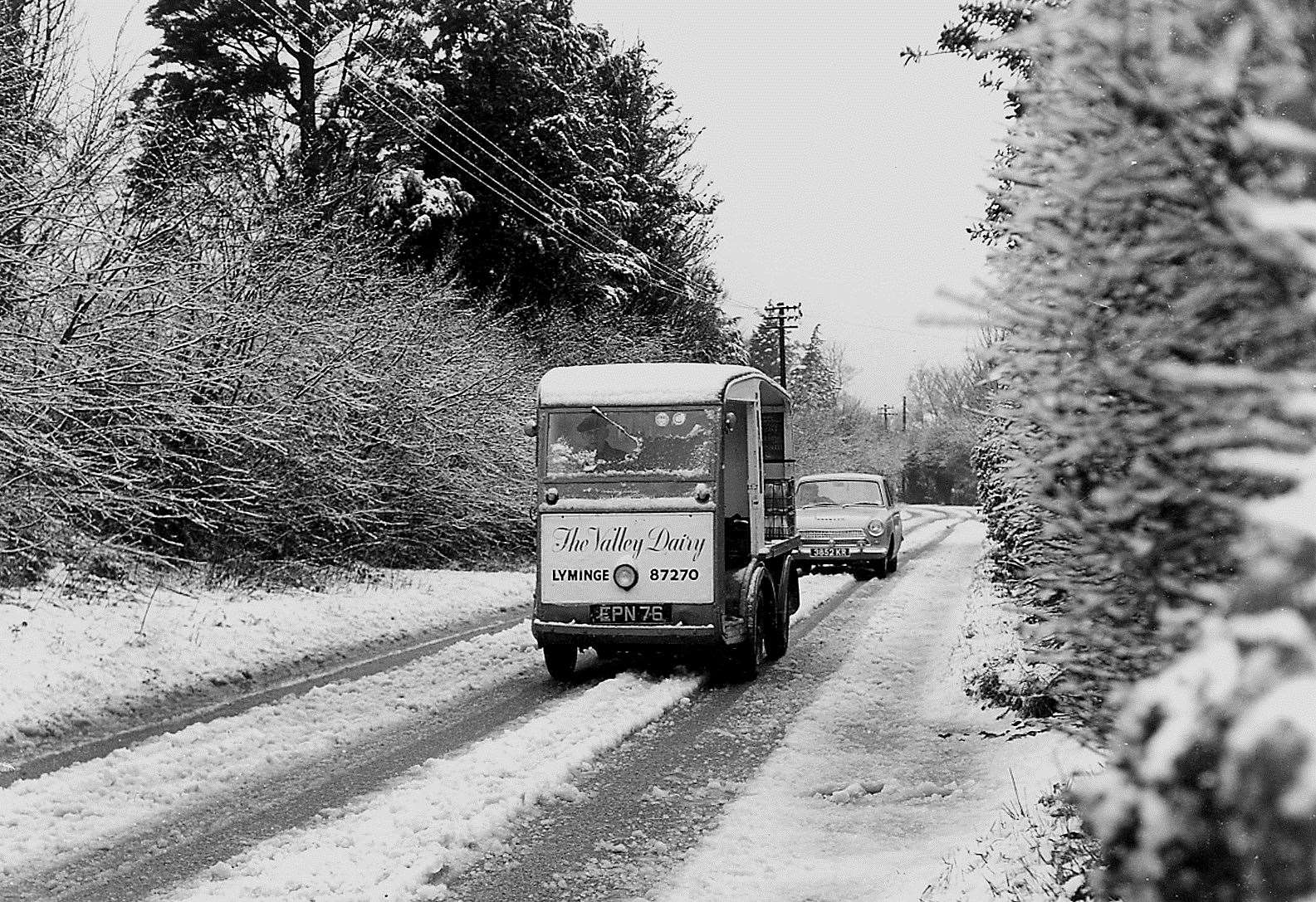 The Valley Dairy at Lyminge endeavours to get the milk through the snow in 1964