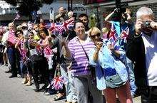 Crowds cheer on the parade in Gravesend