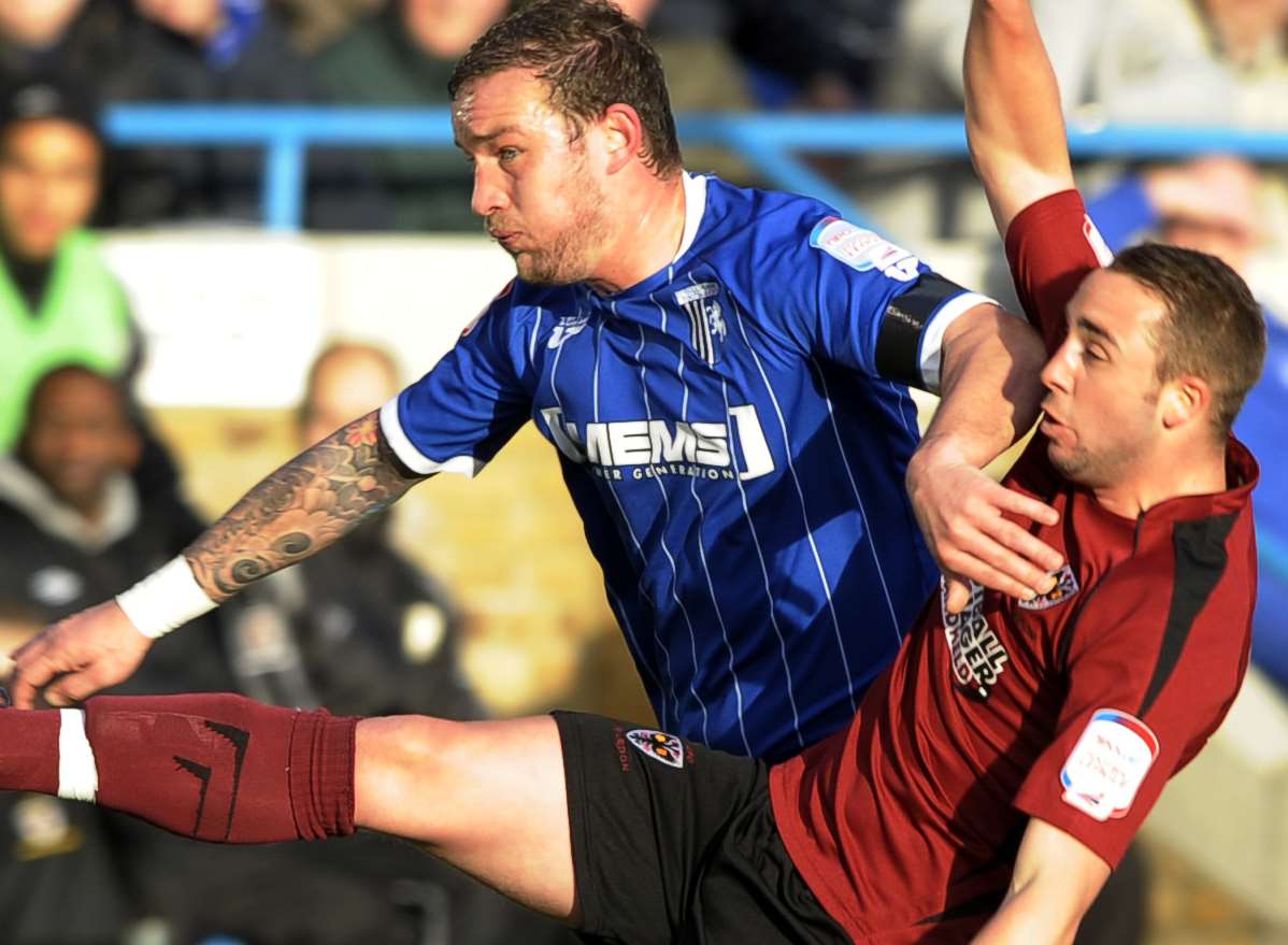 Sammy Moore, right, in action for AFC Wimbledon against Gillingham Picture: Barry Goodwin