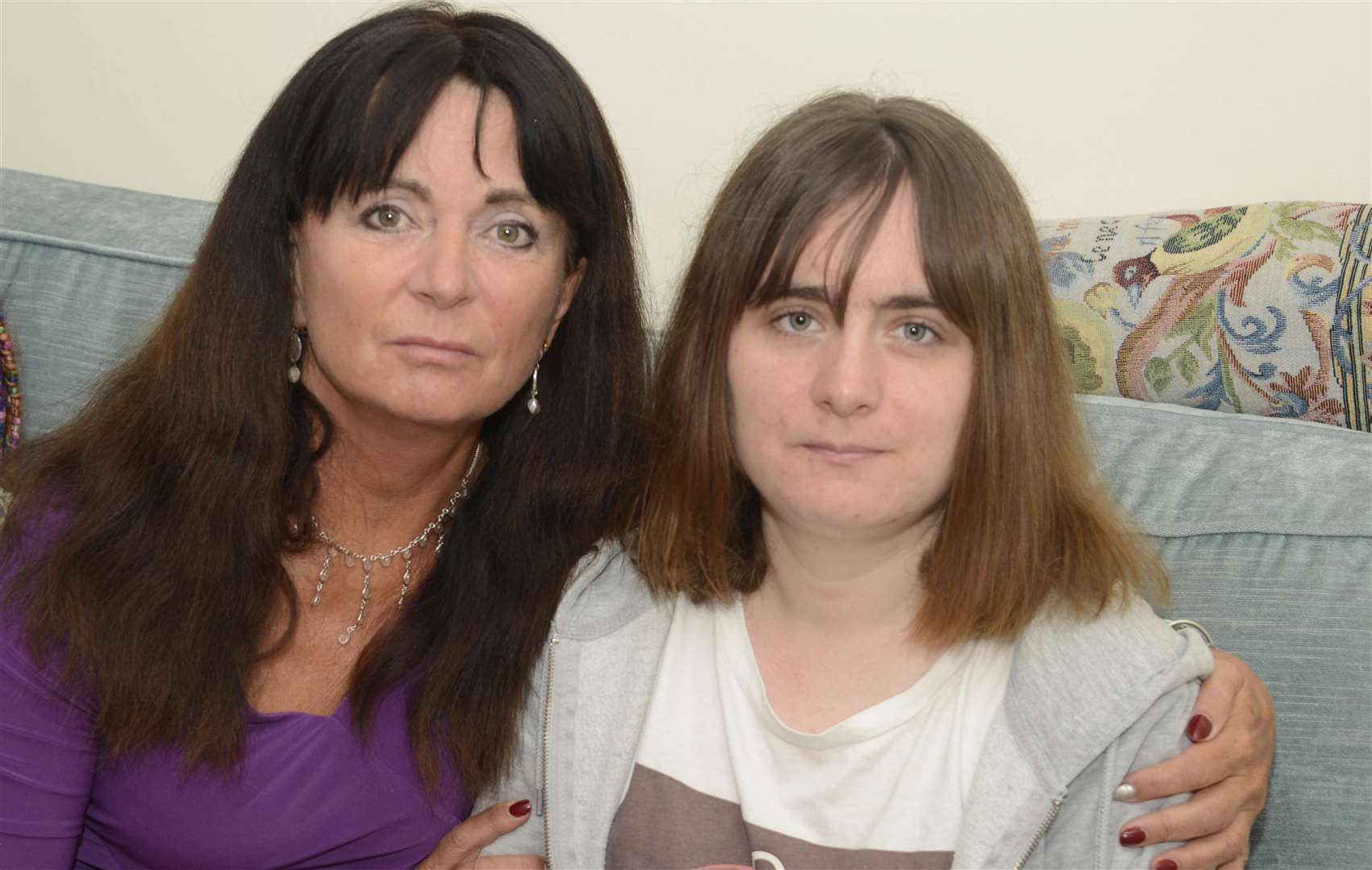 Suzanne Graham-Beer and daughter Lizzie, who is in danger of losing funding