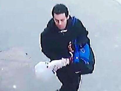 A CCTV image showing Wheeler in Roger's Close, not far from his home, carrying the murder weapon. Picture: Kent Police