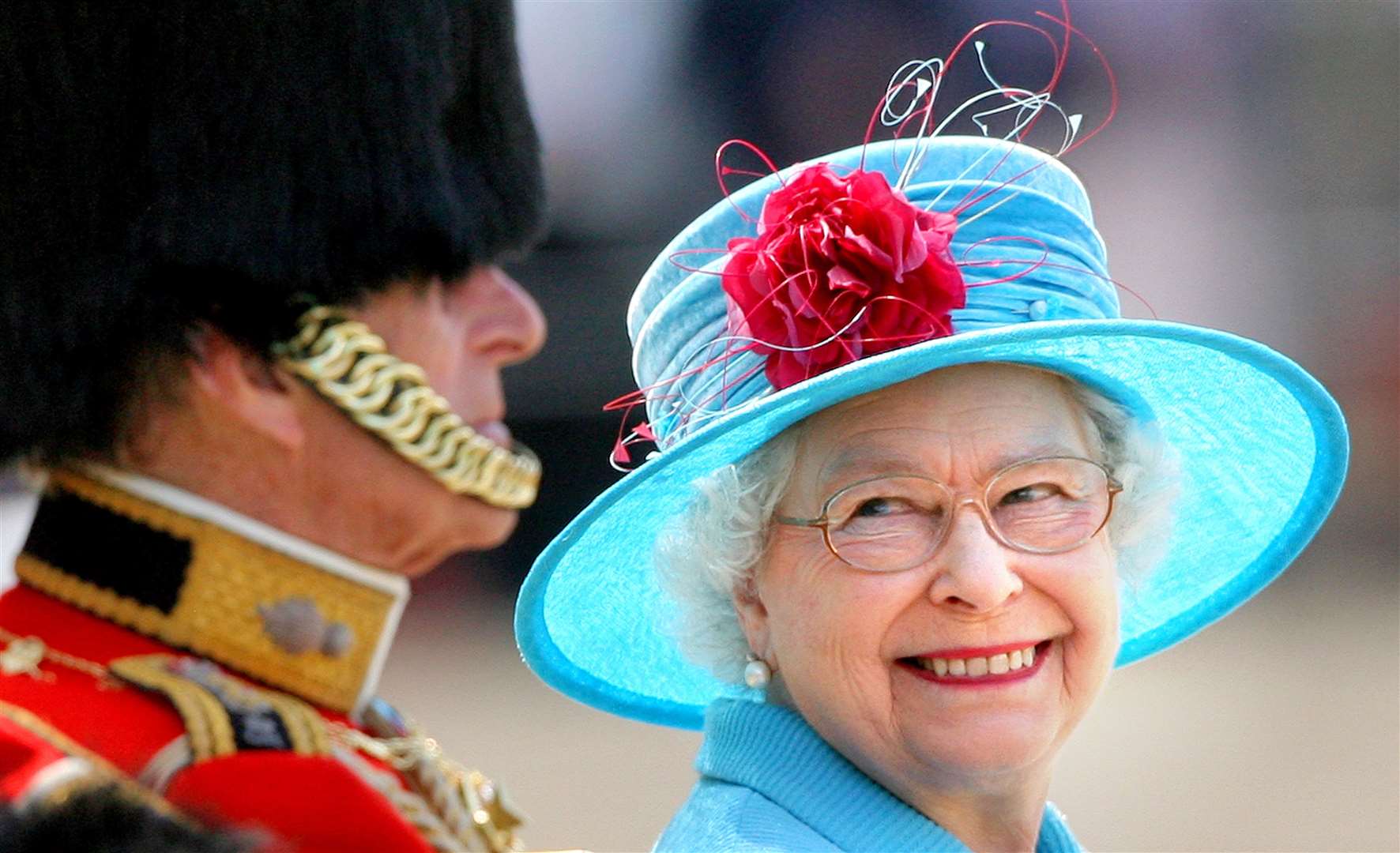 The Queen with Philip at a Trooping the Colour ceremony, which this year will not go ahead in its traditional format (Lewis Whyld/PA)