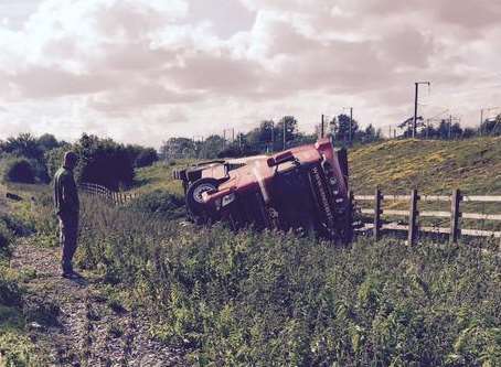 The lorry left the carriageway and turned over on the grass verge. Picture: Charlie Morton
