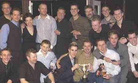 GOOD SPORTS: The Dynamos with the trophy. Picture: ANDY WARDLEY
