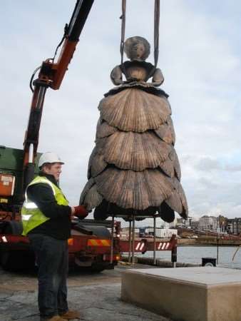 Gently does it - the heavyweight lady is lowered into place. Picture: Martin Jefferies