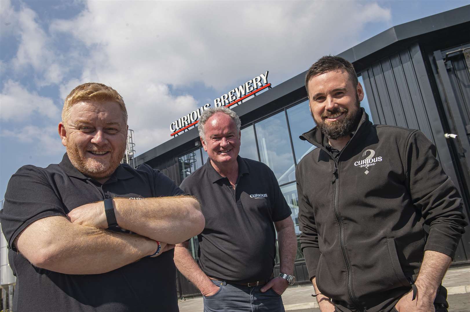 (Left to Right) Simon George, Mark Crowther and head brewer Matt Anderson welcomed customers back to the brewery's taproom on Monday