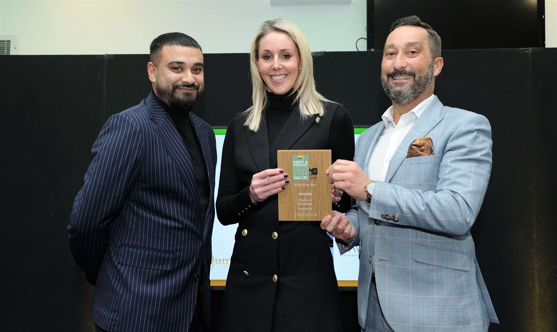 Jamil Trofder (Jumeira) presented Sarah Newman and Sergio Gomes with the award for Hotel of the Year on behalf of The Cave, a stylish hotel in Boughton-under-Blean, between Faversham and Canterbury, that has welcomed a number of celebrity guests, including Jesy Nelson, Katie Price, Jordan Banjo and Carrie Hope Fletcher. Picture: Simon Hildrew