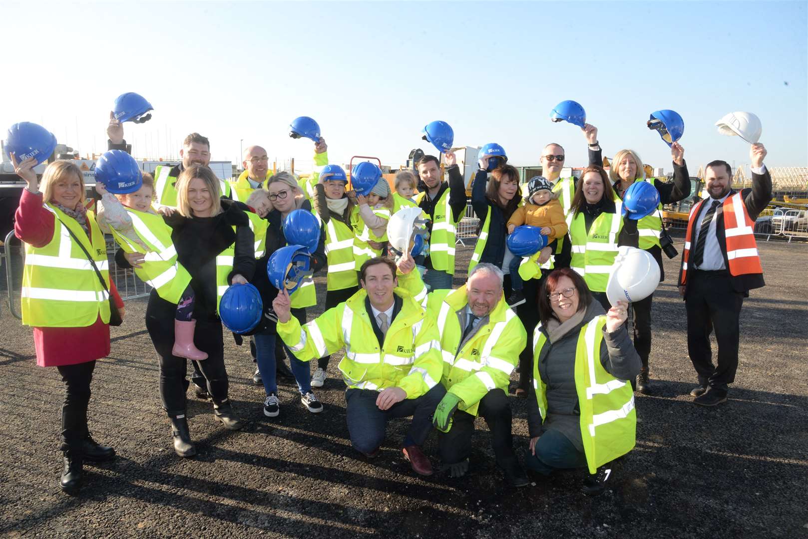 Staff, the design team and prospective parents and pupils at the lifting in ceremony at Springhead Park Primary School on Tuesday. Picture: Chris Davey. (27434949)