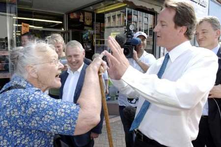 KM Group photographer Matthew Walker captures the moment David Cameron was confronted by the first woman.