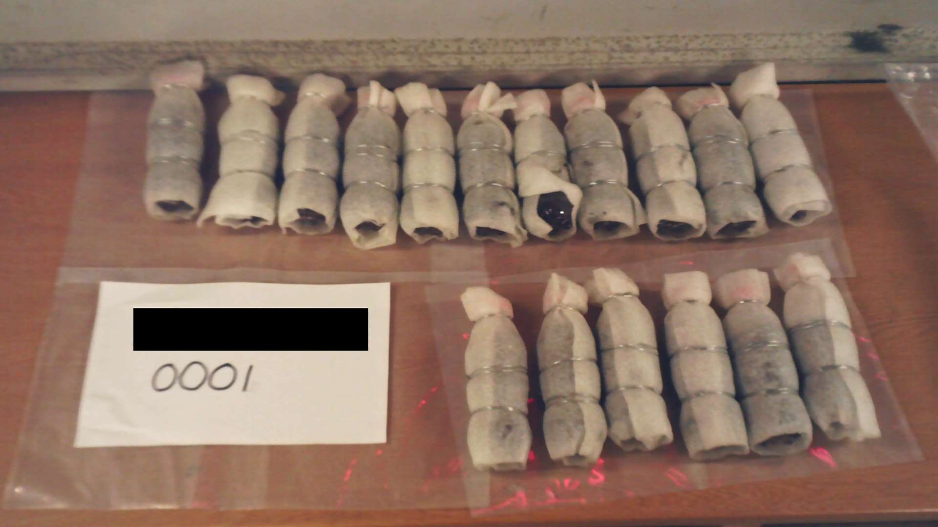 A search of the BMW found 17 bottles containing about 6kg of opium, with an estimated street value of more than £90,000. Picture: National Crime Agency
