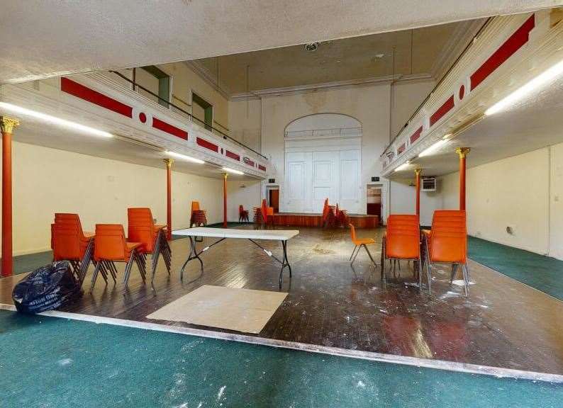 Stacks of chairs remain inside the derelict building. Picture: Miles and Barr estate agents