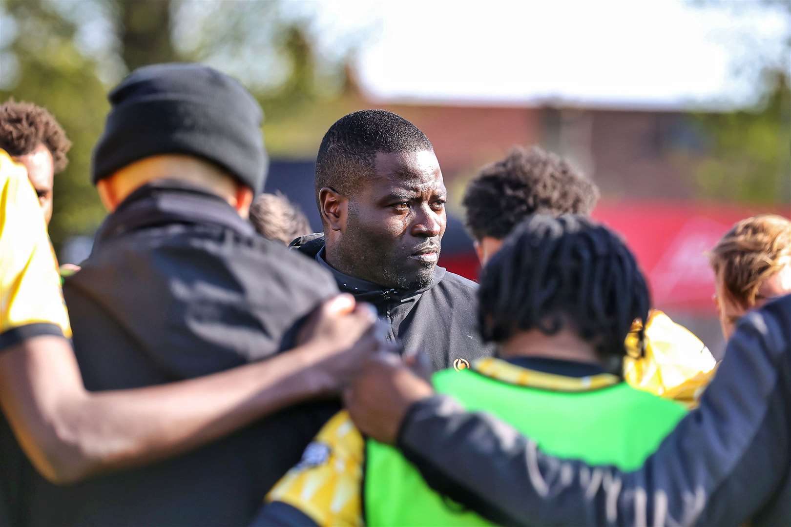 Maidstone manager George Elokobi addresses his players after their 2-1 play-off semi-final defeat at Worthing. Picture: Helen Cooper