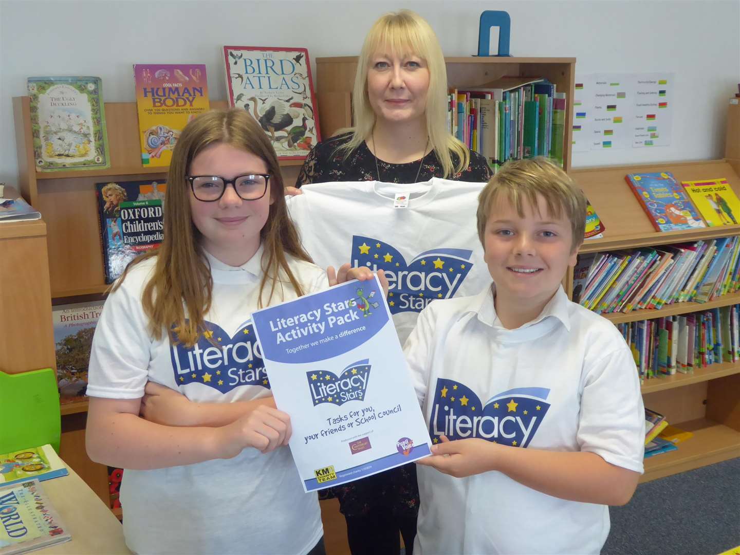 Literacy Stars Tegan Smith and Rhys Dinmore of Richmond Academy with teacher Lesley Conway. (2356974)