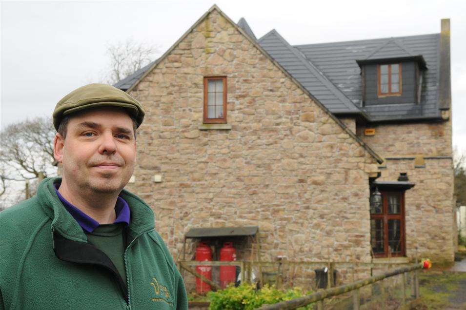 Stephen Shirley outside his Challock home, which was struck by lightning
