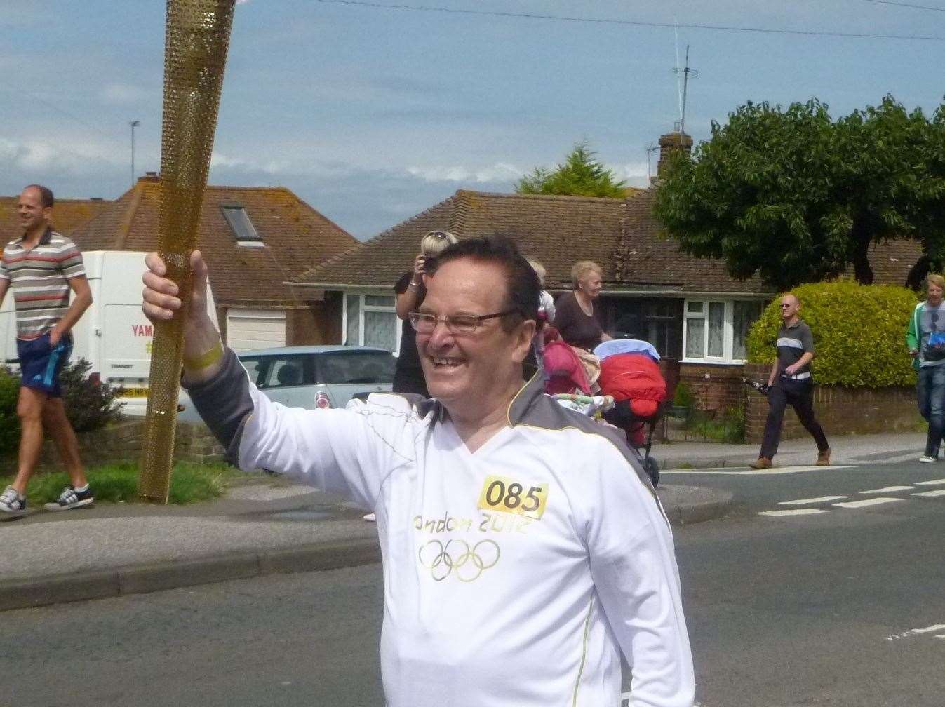 Dale carries the Olympic torch