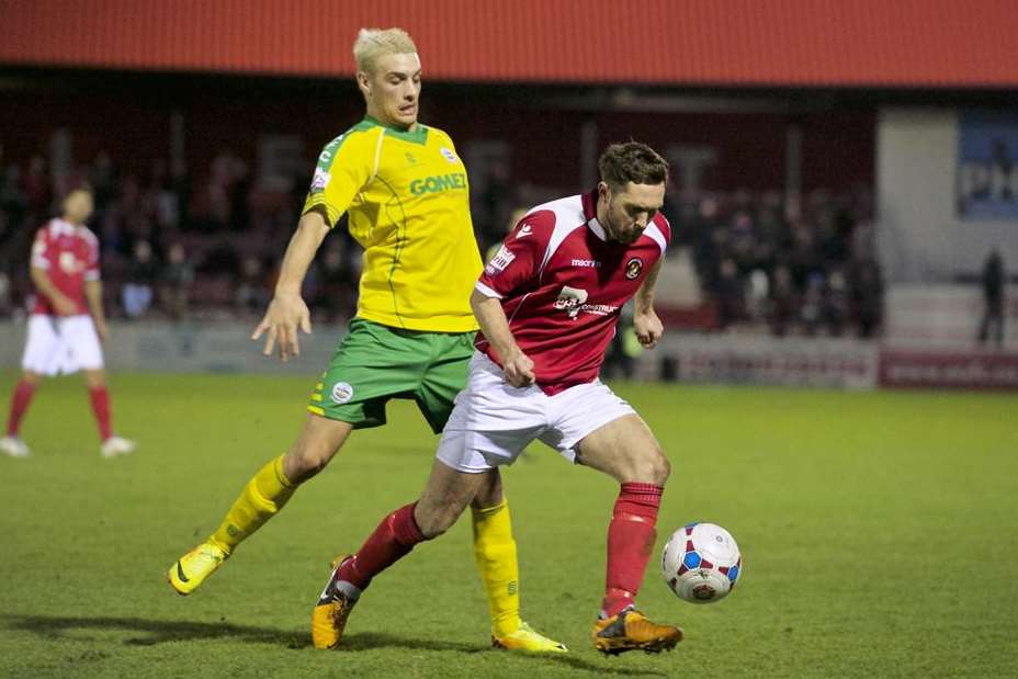 Dean Rance tries to get away from Liam Bellamy (Pic: Andy Payton)