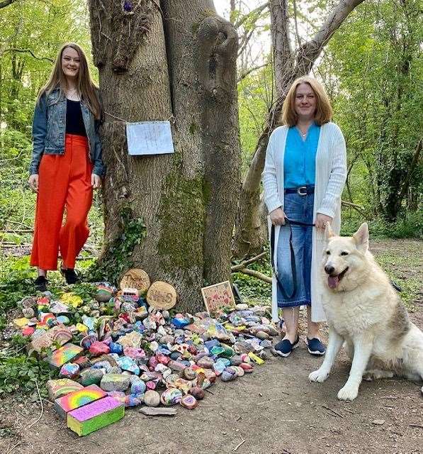 Ruth Willshire, her daughter Gabrielle and their dog Bella by Logan's tree in Taddington Wood, Chatham