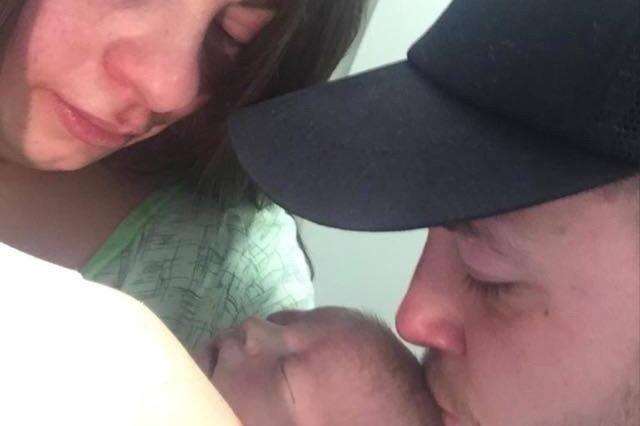 Baby Arlo with his parents Chloe Sullivan and Michael Parrott (4861208)