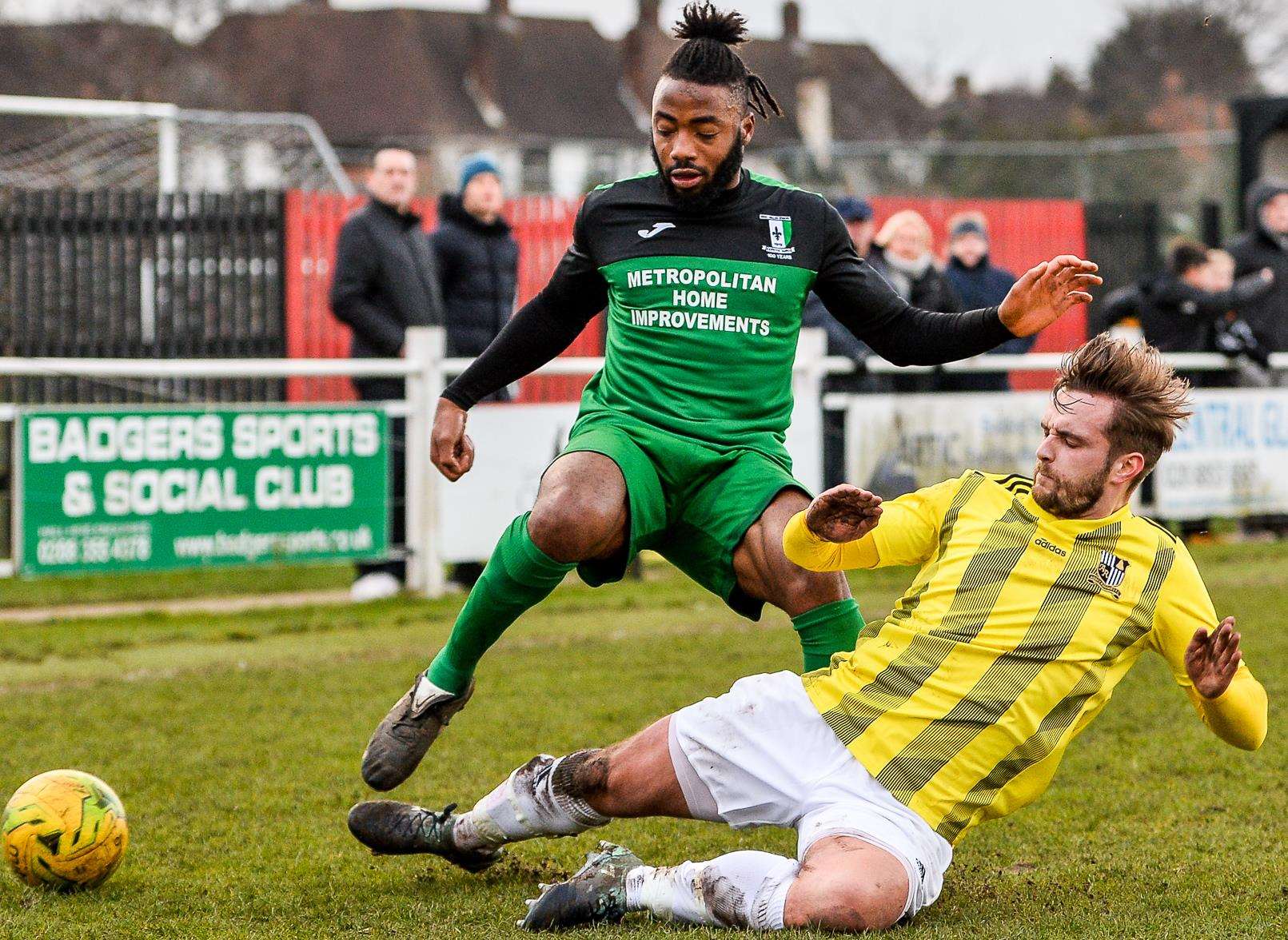 Cray's Denzel Gayle is challenged by Abbey Rangers. Picture: Dave Budden
