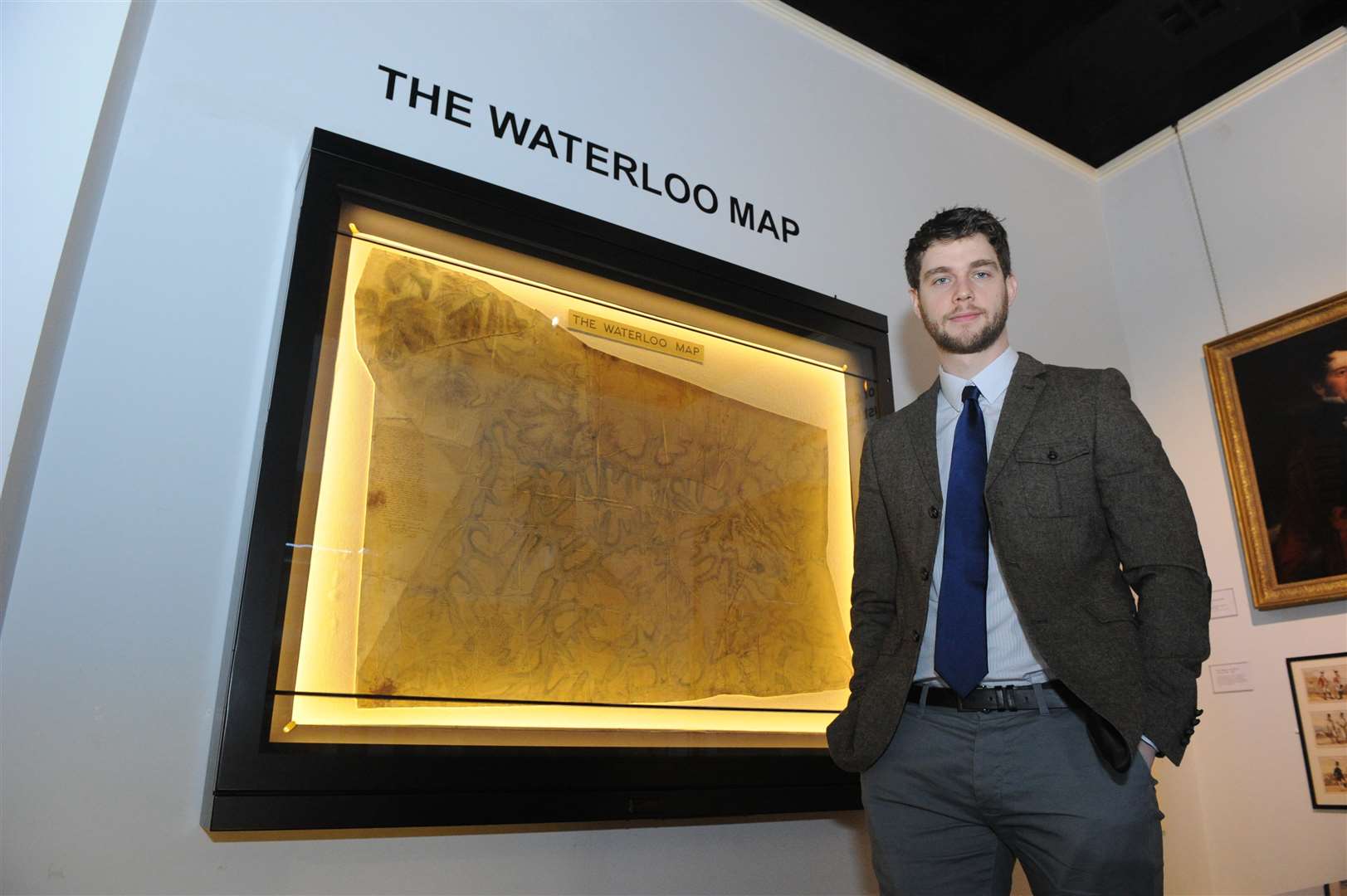 Deputy Curator James Scott with the map used by Wellington at Waterloo