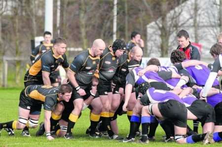 Canterbury (black shirts) battle for possession against Exmouth on Saturday
