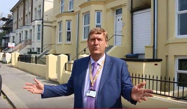 Dover District Council leader Keith Morris outside three properties the authority renovated in Folkestone Road, Dover