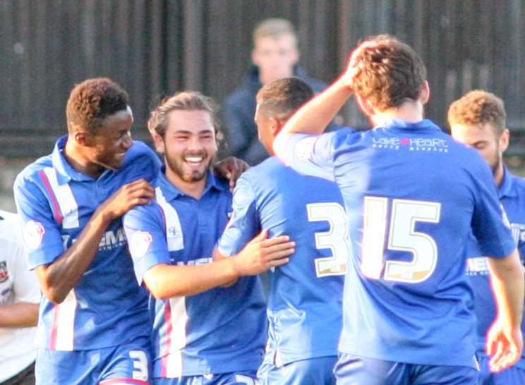 Bradley Dack celebrates his goal with Gills team-mates Picture: Ed Boyden