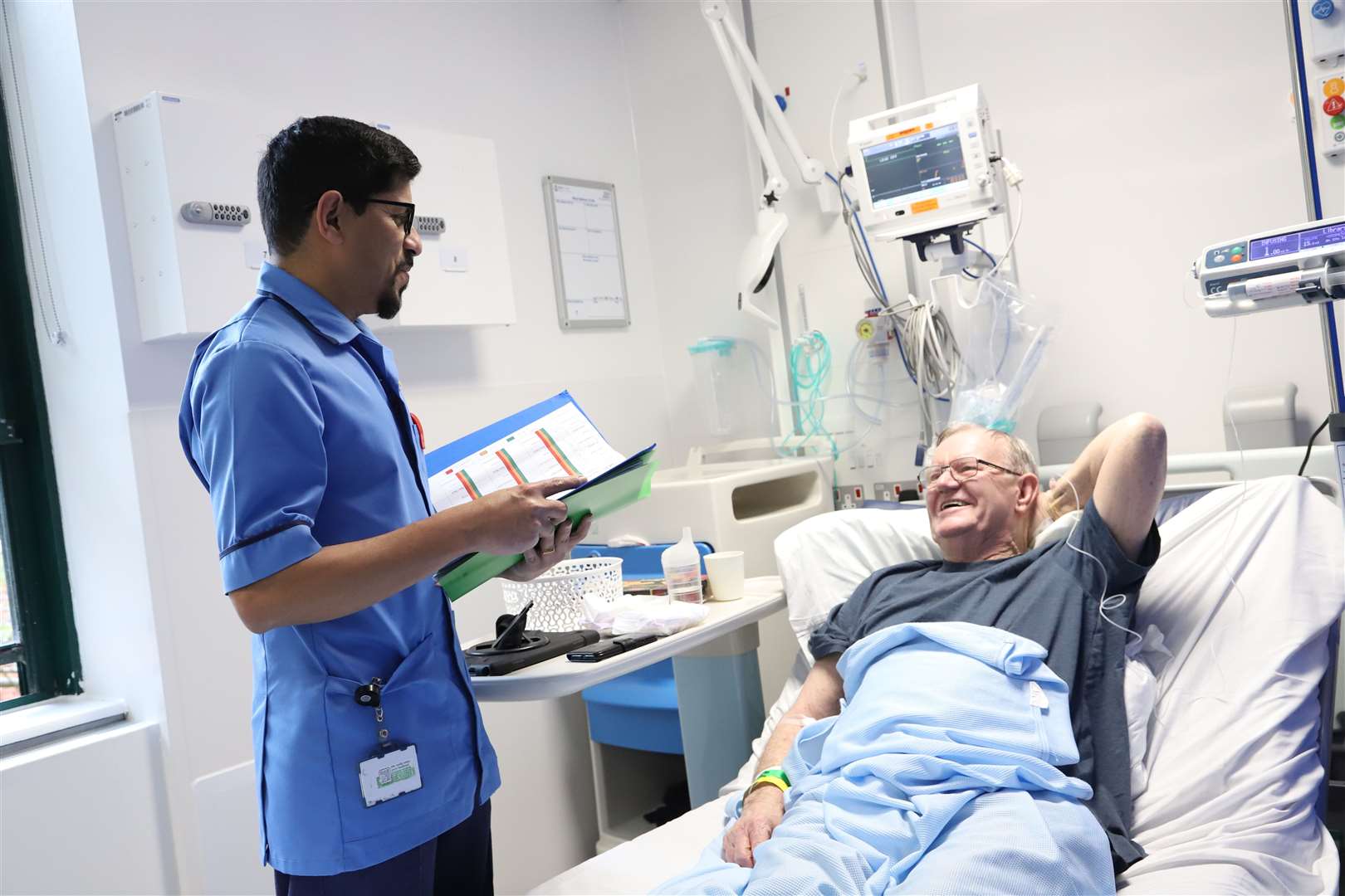 Nurse Subin talking to patient Gerald. Picture: NHS