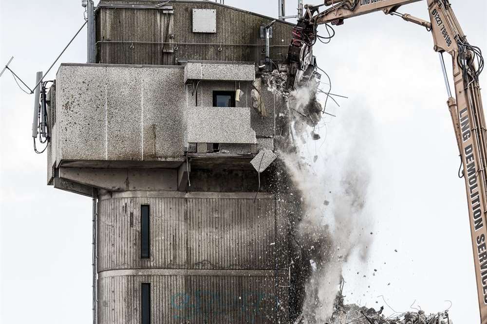 The iconic concrete pilot tower in Folkestone Harbour is demolished to make way for the seafront redevelopment. Picture: Freddie Lee Thompson