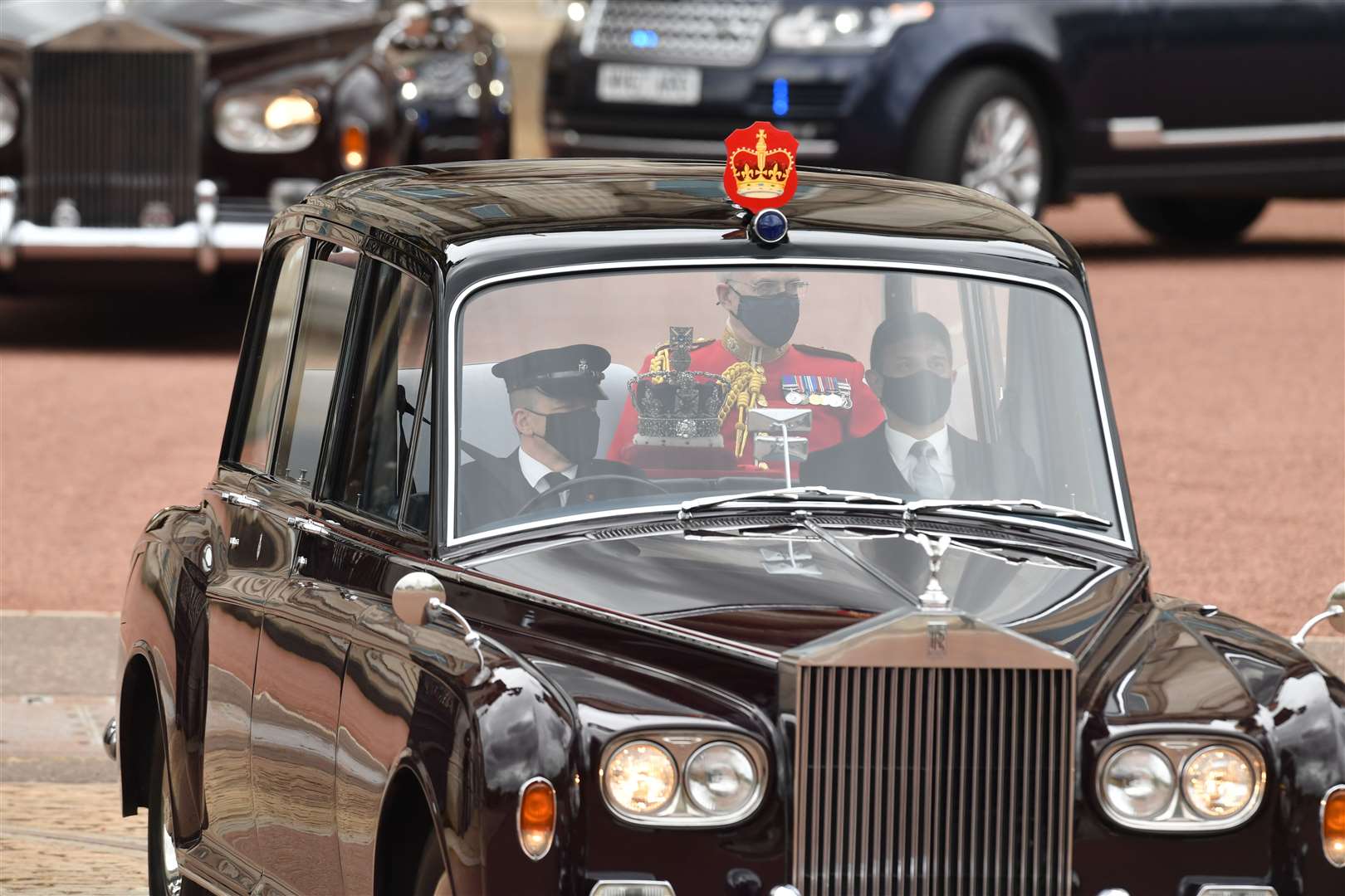 The Imperial State Crown leaves Buckingham Palace by car to be taken to the Palace of Westminster (Dominic Lipinski/PA)