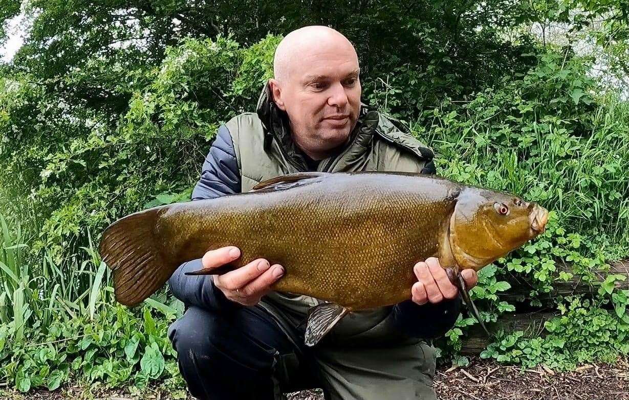 Ashford angler Kevin Durman landed a great catch of tench,including this super 9lb fish
