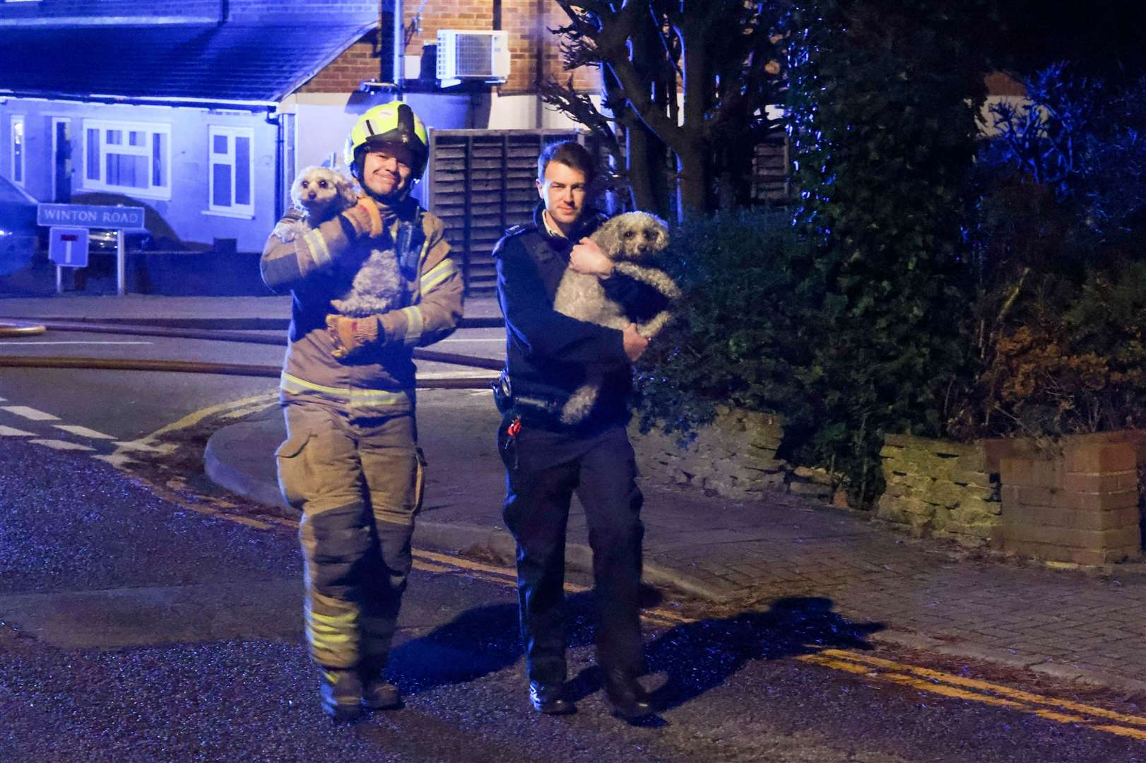Two dogs were saved by fire crews and police officers. Picture: UKNIP