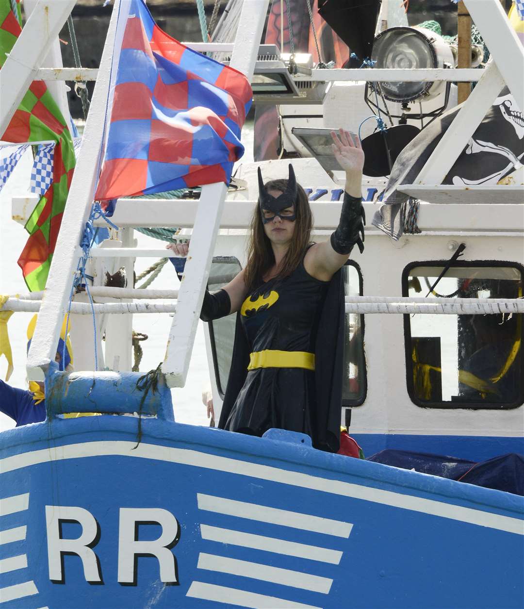 Cat Woman waves to the crowds at last year's race Picture: Paul Amos