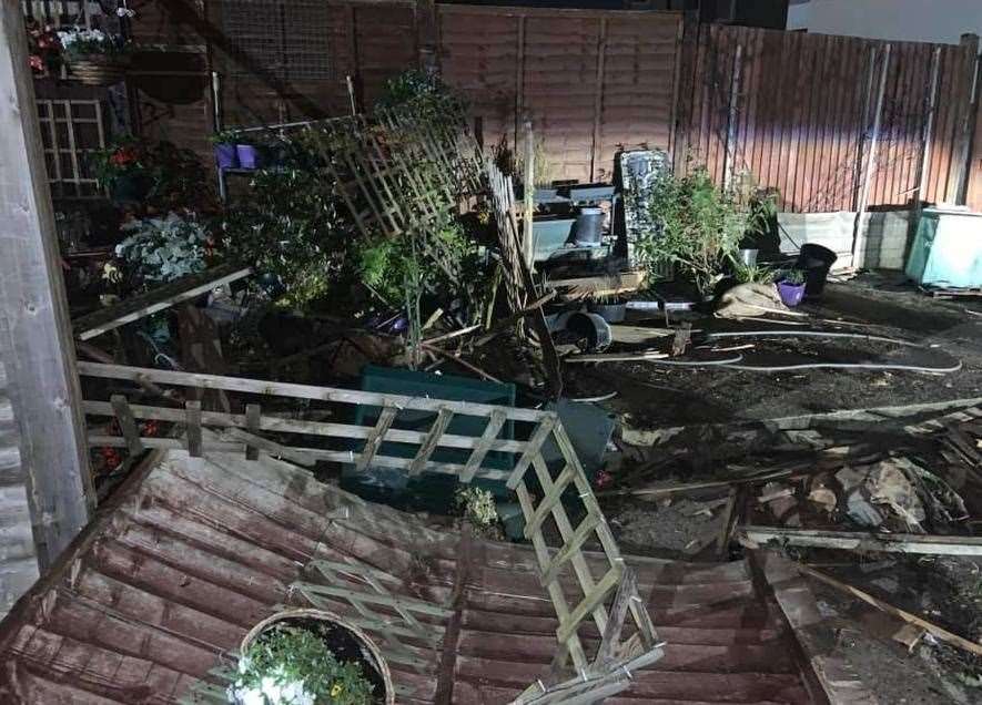 A car ploughed into a family's garden in Perry Street, Gravesend, last night. Picture: Lou Smith