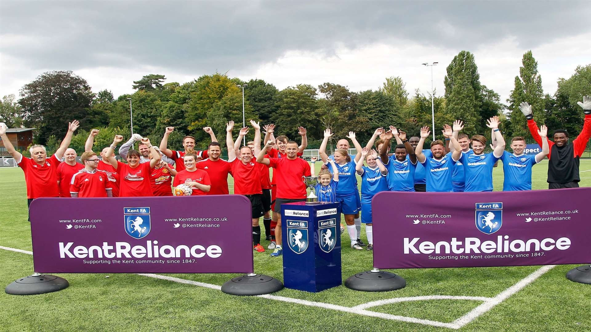 The Kent Reliance and Kent FA team and opponents Demelza House at the Community Day