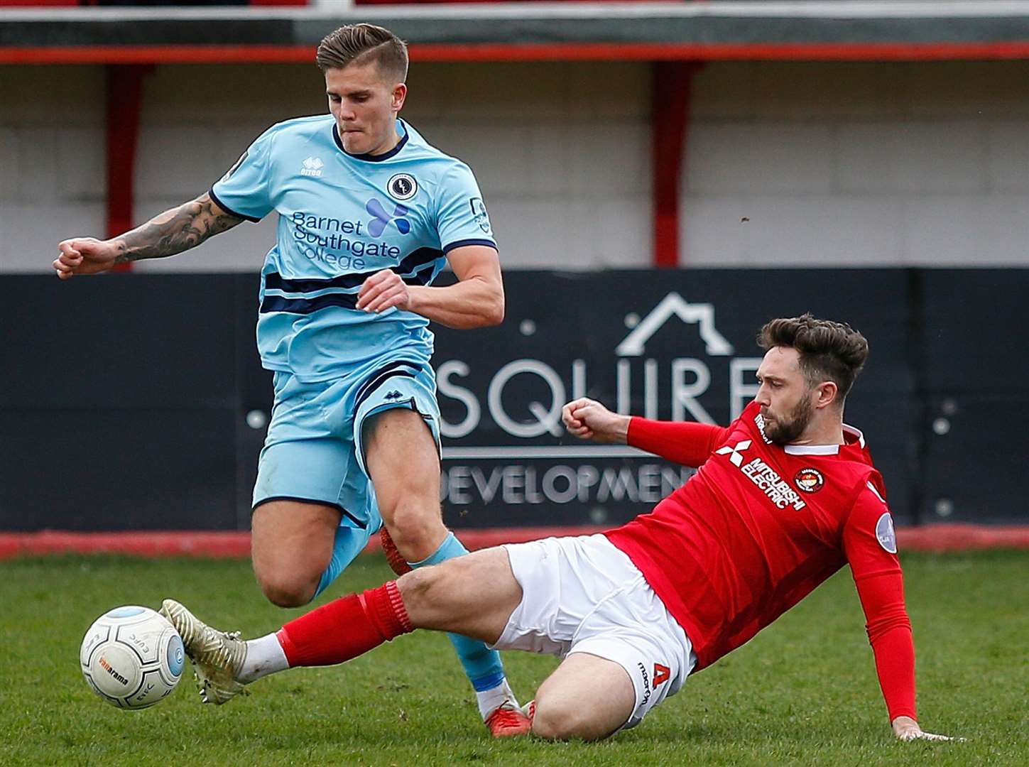 Dean Rance slides in to win the ball for Ebbsfleet against Boreham Wood Picture: Andy Jones
