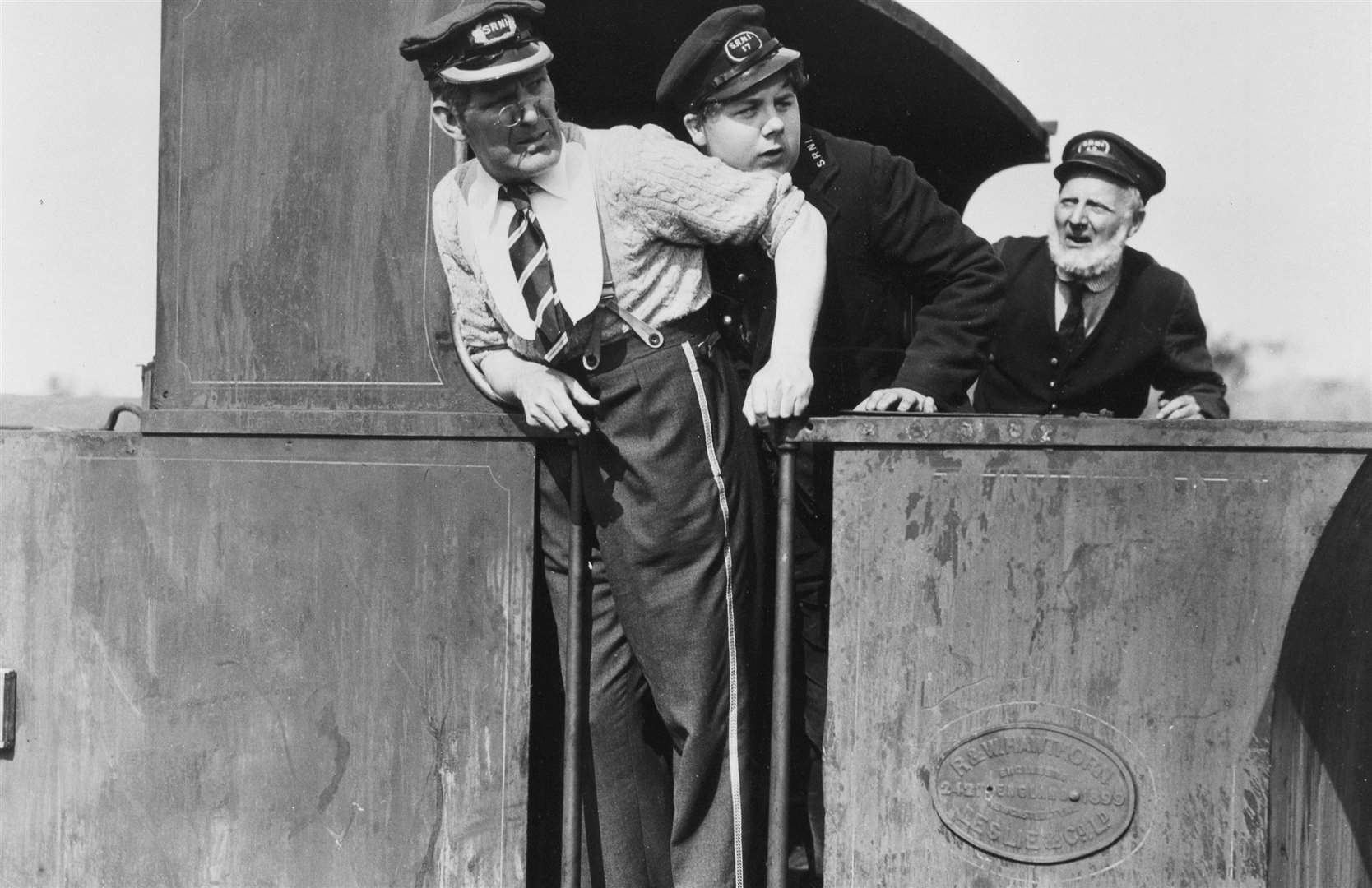 Actor Will Hay and others on board the KESR loco Northiam, renamed Gladstone for Oh Mr Porter!