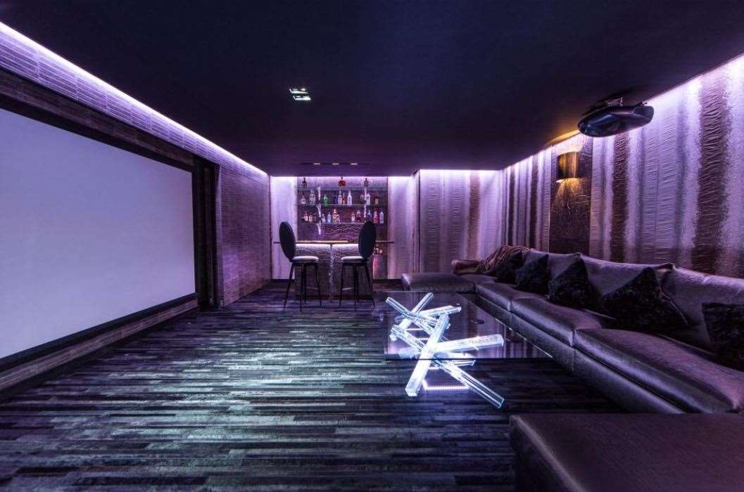 Entertain your guests with your very own cinema room. Picture: John D Wood