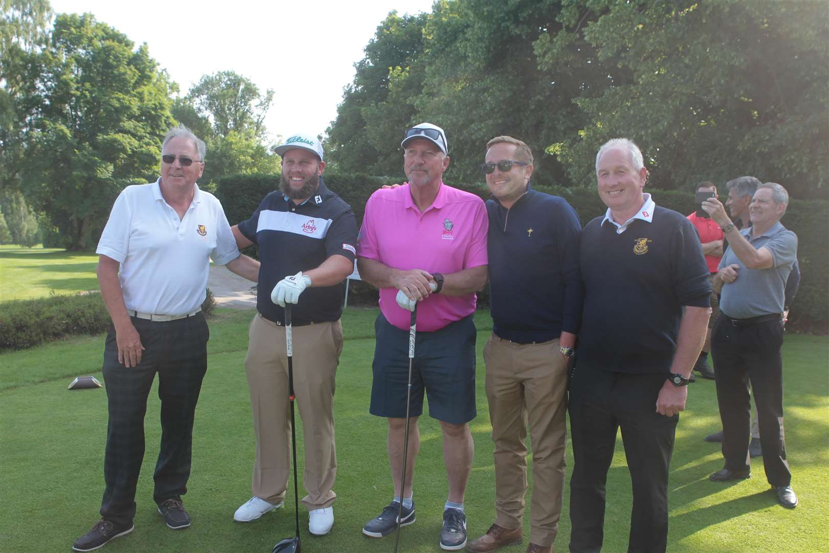 From left, John Foggerty, Captain, Ian Botham, Andrew Johnston, Jamie Lane, a caddie for Matt Fitzpatrick and Chris Twiner, sponsor at Lamberhurst Golf whereBotham and Johnston were flown in to play one round of golf at the 18th hole to raise money for charity. Picture by: John Westhrop (2422749)