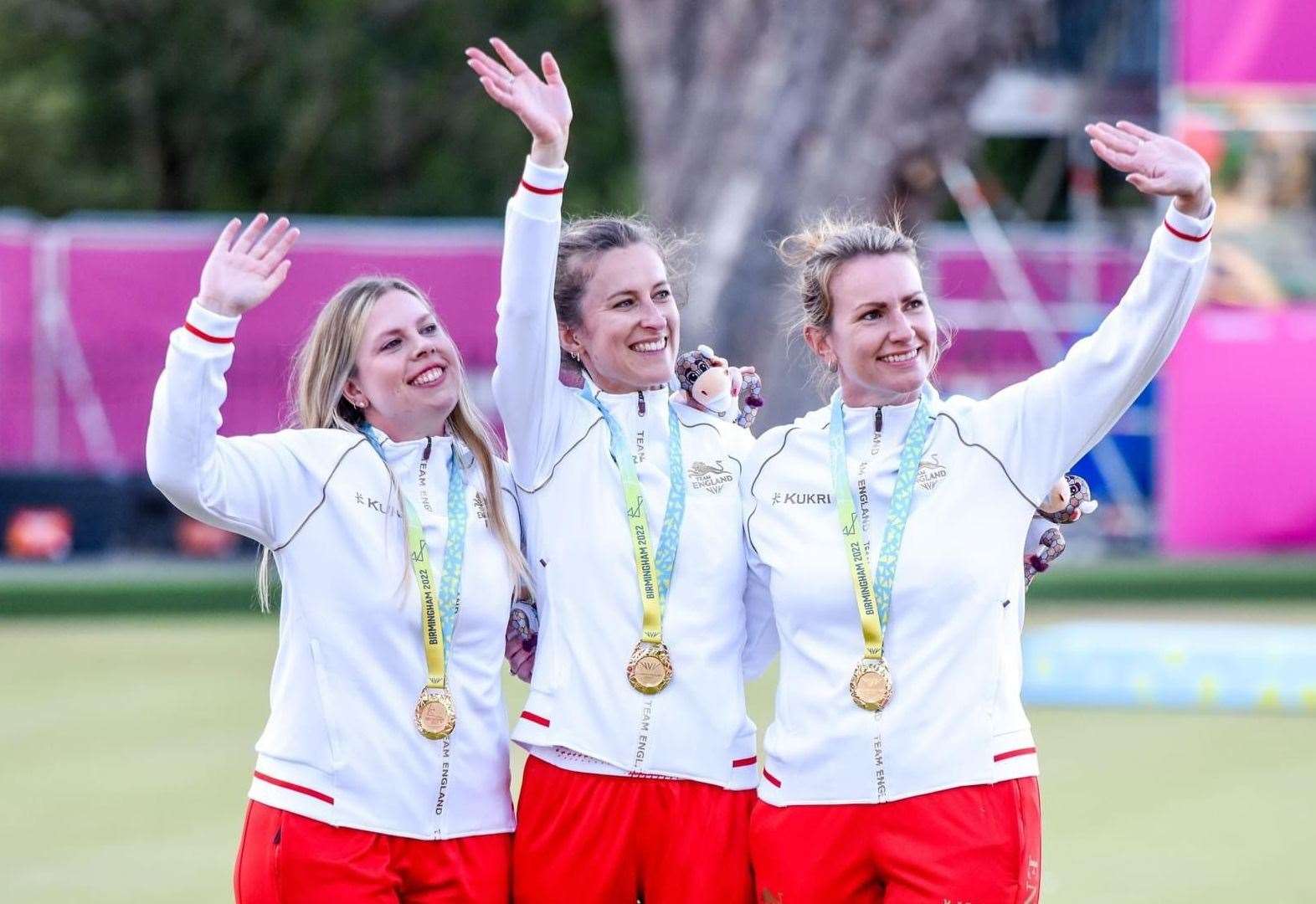 Sian Honnor alongside Natalie Chestney and Jamie-Lea Winch, donning their gold medal