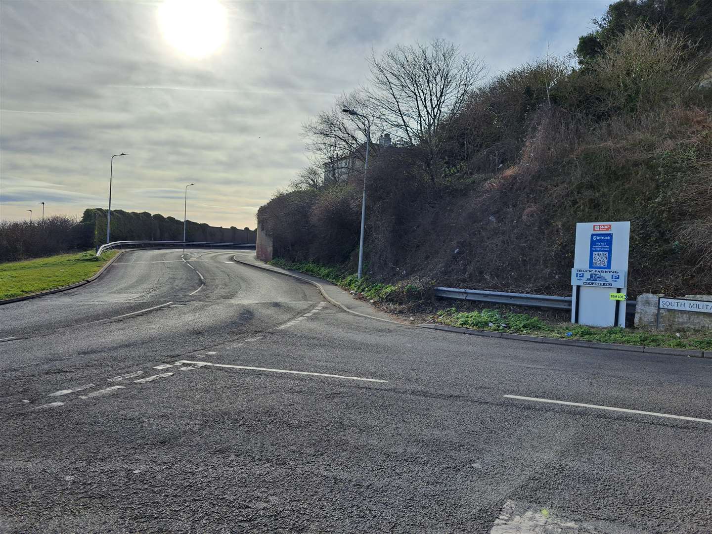 The sign is close to the Old Folkestone Road turn-off into Aycliffe but the arrows point the other way