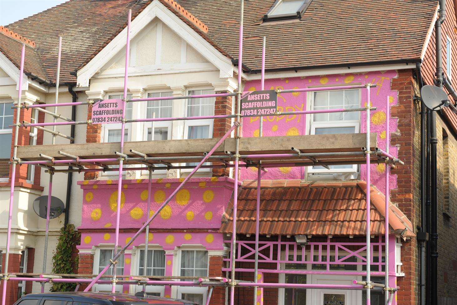 Painted pink and covered in yellow spots, the finished Mr Blobby house in Dartford