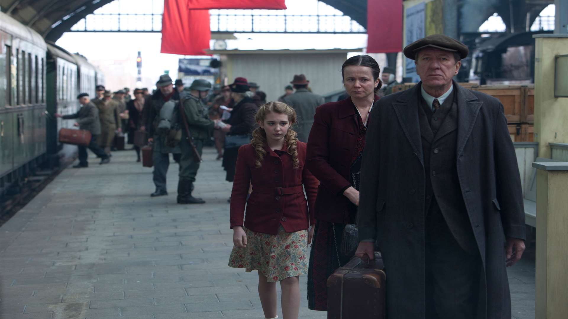 The Book Thief, with Liesel (Sophie Nelisse) meeting new foster parents Hans (Geoffrey Rush) and Rosa (Emily Watson). Picture: PA Photo/Fox UK Film