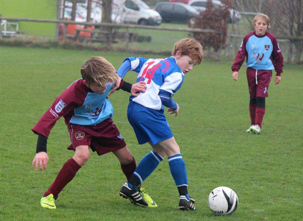 Bredhurst Juniors and Wigmore Youth do battle in Under-12 Division 2 Picture: Darren Small