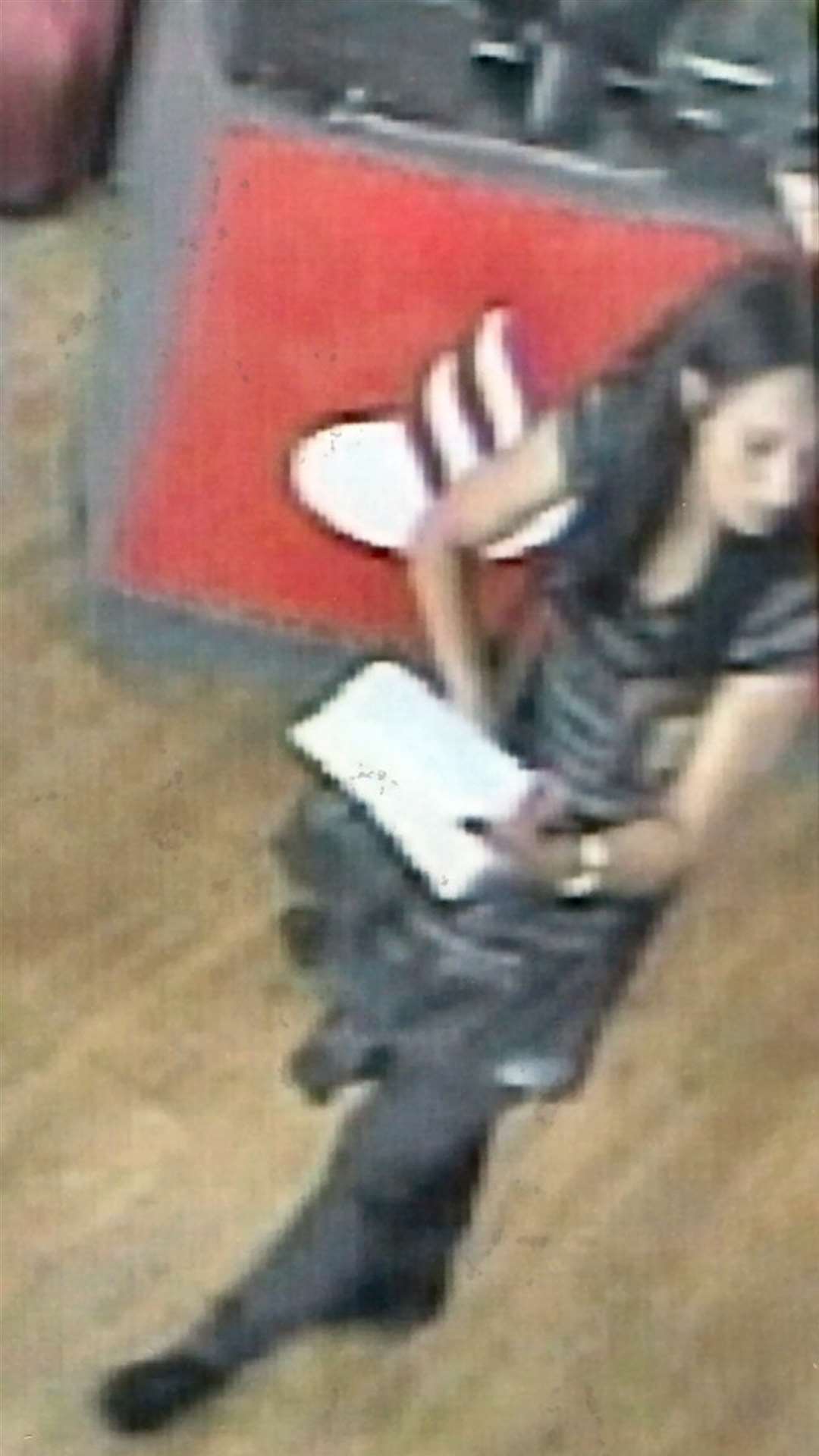 Police released CCTV footage of this woman in connection with a card theft in the town