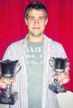 Dynamos' Joe White with his awards