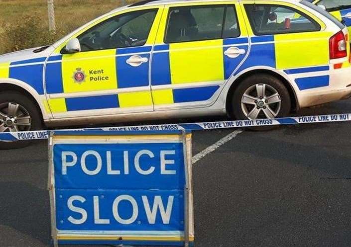 A road was closed after a car overturned. Stock picture